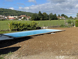 Terrassement et installation d'une piscine en bois creusée
